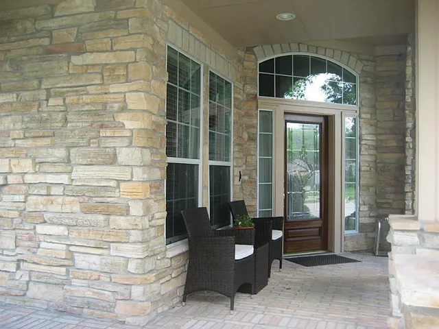 a front view of a house with outdoor space