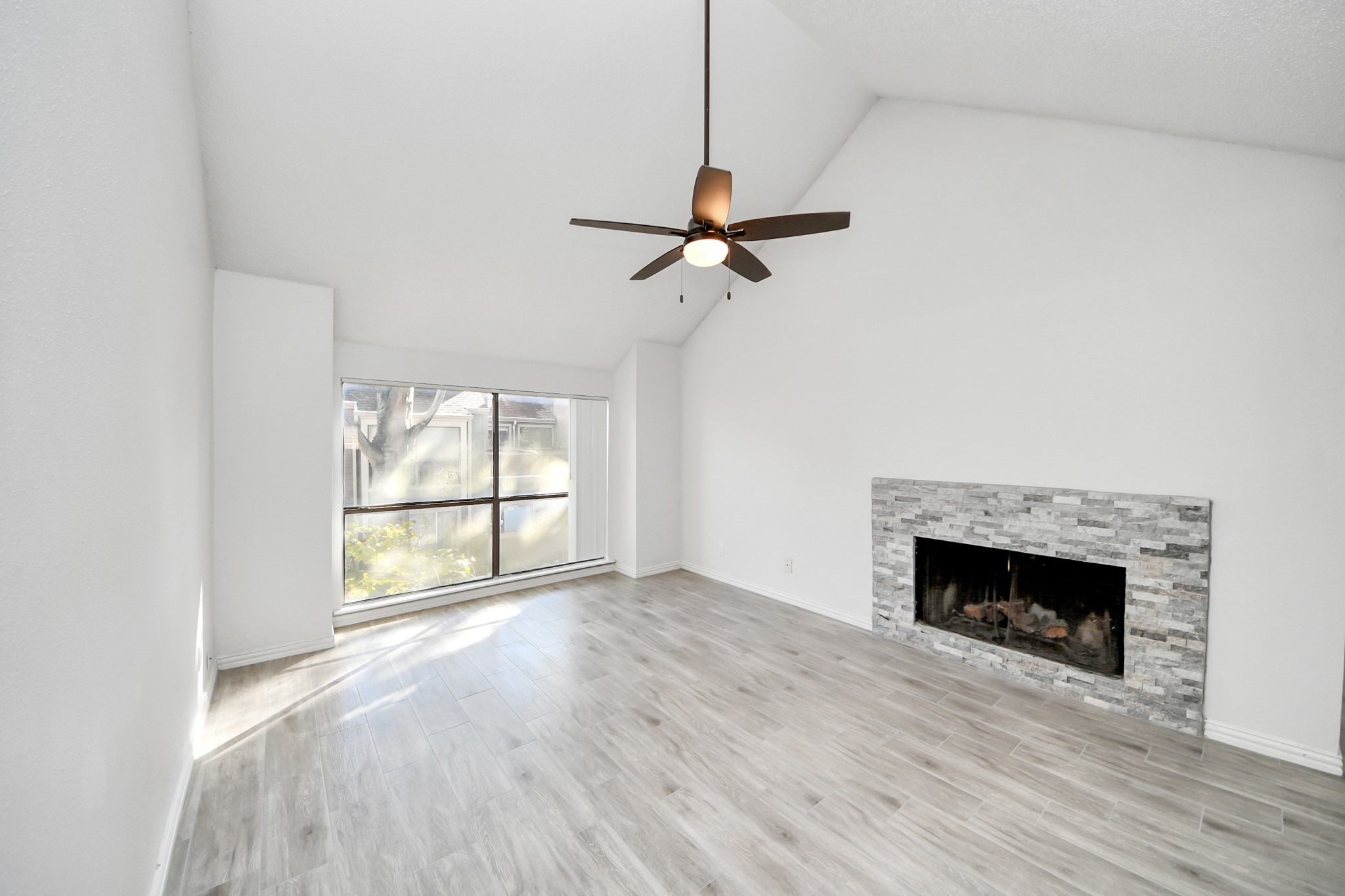 6601 Sands Point Drive, Unit 47 Houston, TX 77074 - Photo 3 of 46 a view of empty room with wooden floor and fan