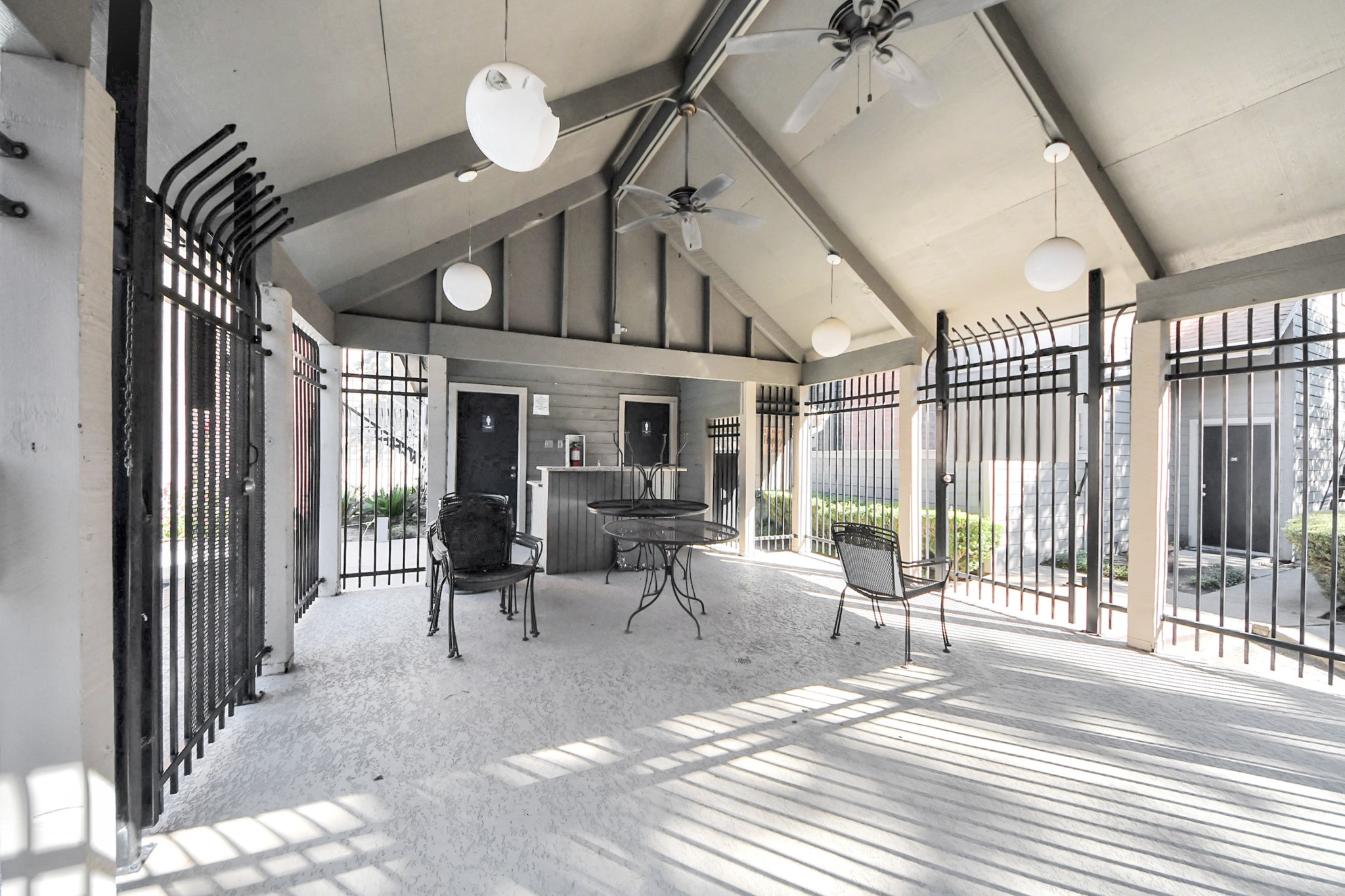 6601 Sands Point Drive, Unit 47 Houston, TX 77074 - Photo 42 of 46 a view of a hallway with wooden floor and chandelier