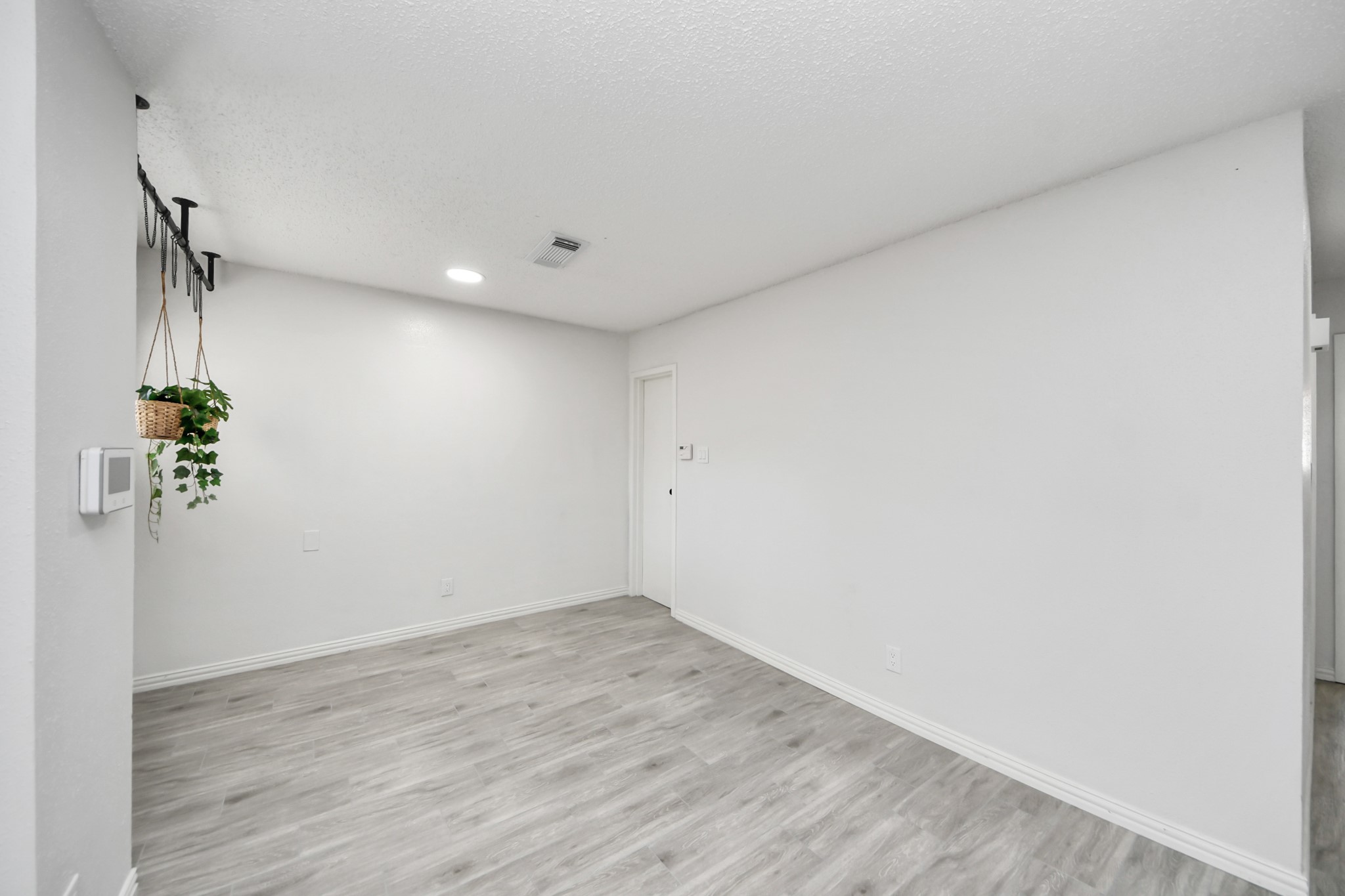 6601 Sands Point Drive, Unit 47 Houston, TX 77074 - Photo 8 of 46 a view of room with wooden floor