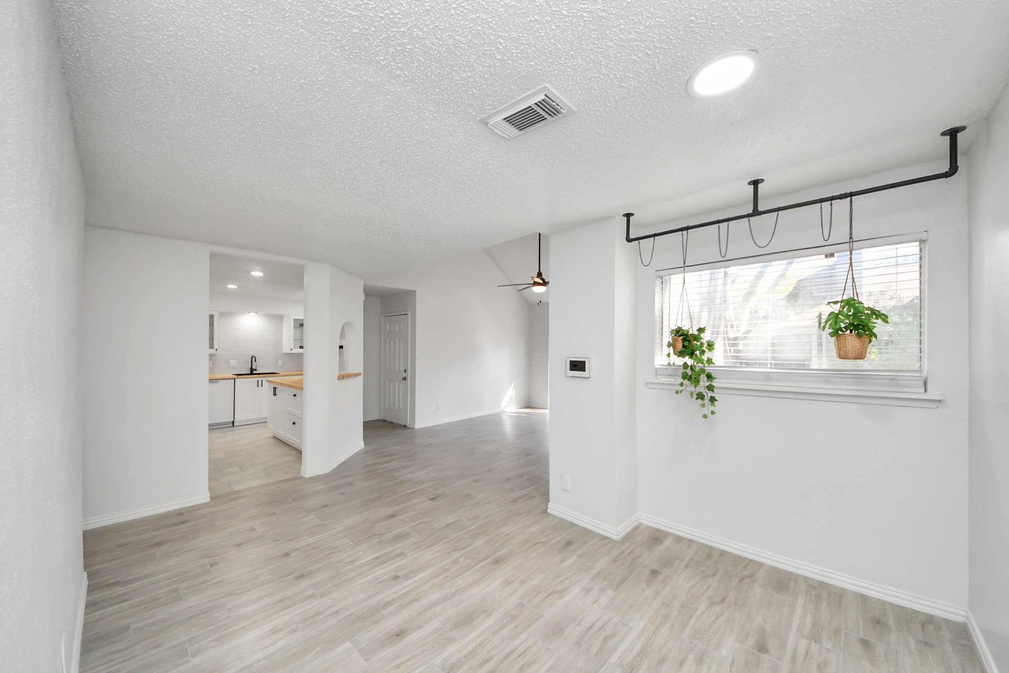 6601 Sands Point Drive, Unit 47 Houston, TX 77074 - Photo 9 of 46 a view of empty room with wooden floor