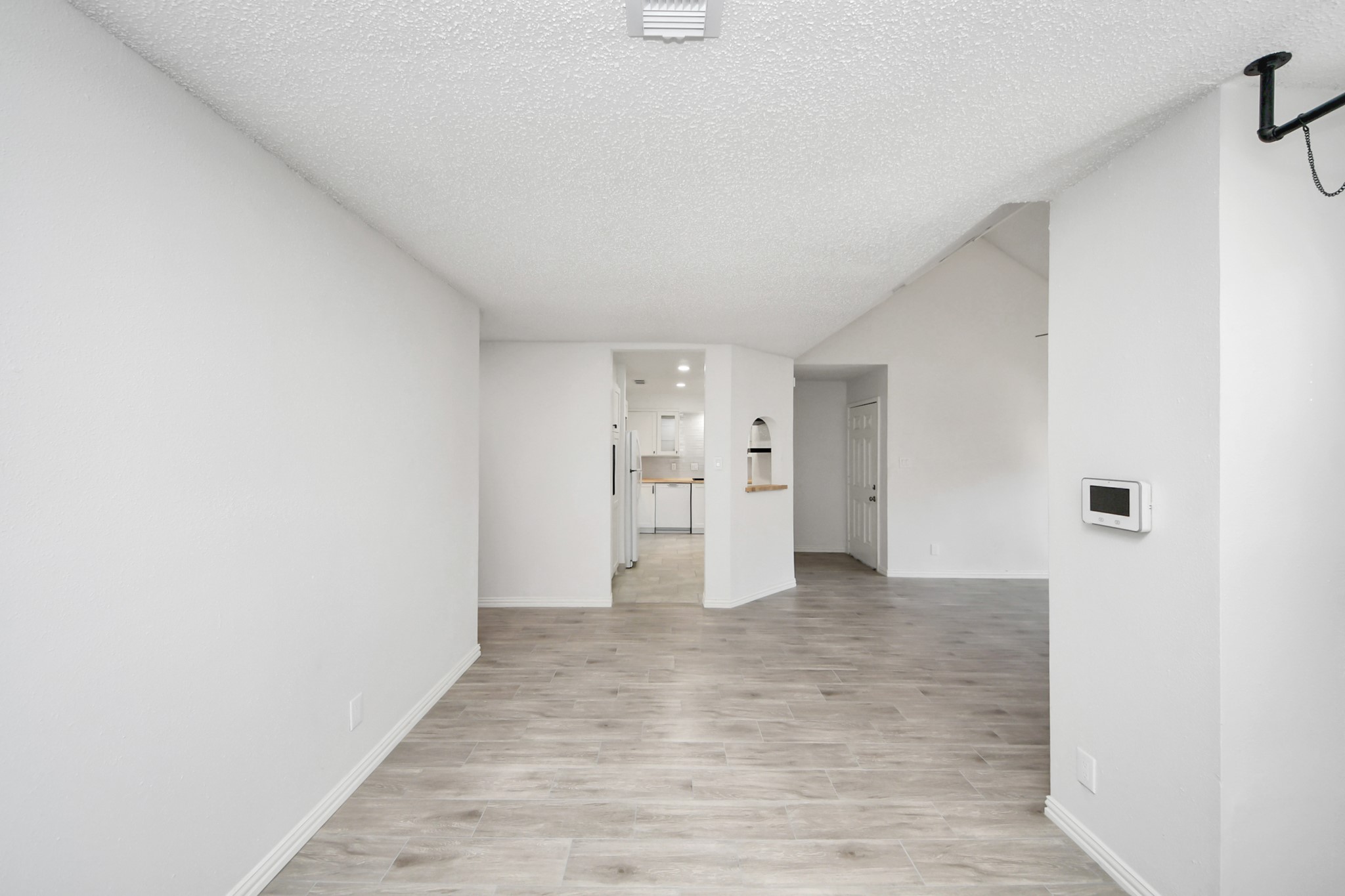 6601 Sands Point Drive, Unit 47 Houston, TX 77074 - Photo 10 of 46 a view of a big room with wooden floor and windows