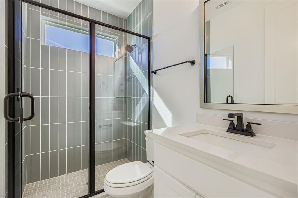 2650 Merrell Court Prosper, TX 75078 - Photo 15 of 28 a bathroom with a sink toilet and shower