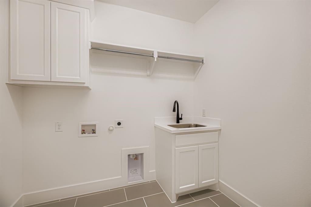 2650 Merrell Court Prosper, TX 75078 - Photo 22 of 28 a view of a kitchen with a sink