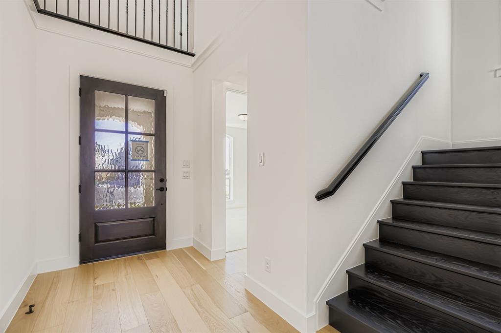 2650 Merrell Court Prosper, TX 75078 - Photo 4 of 28 a view of an entryway with staircase
