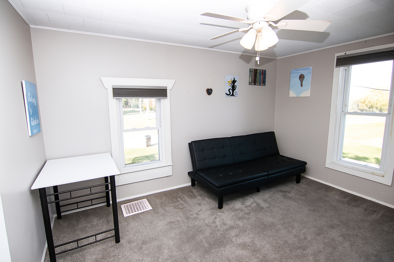 29736 Highway 23 Genoa, IL 60135 - Photo 12 of 16 a living room with furniture and a window