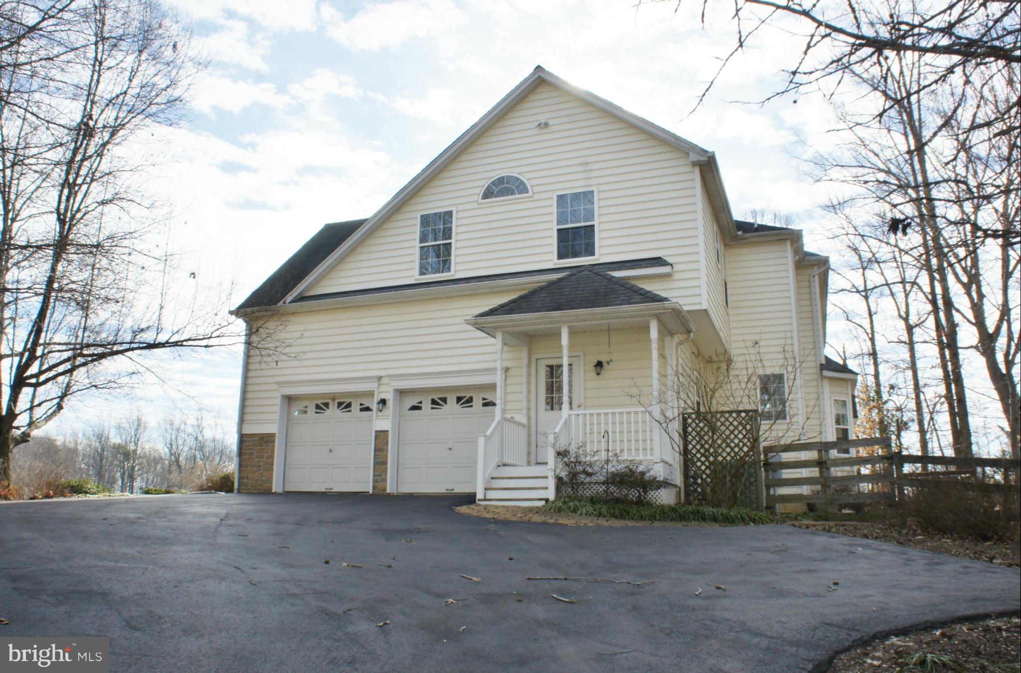 4614 Green Ridge Court Huntingtown, MD 20639 - Photo 29 of 30 Oversized 2 car garage w/covered porch side entry!