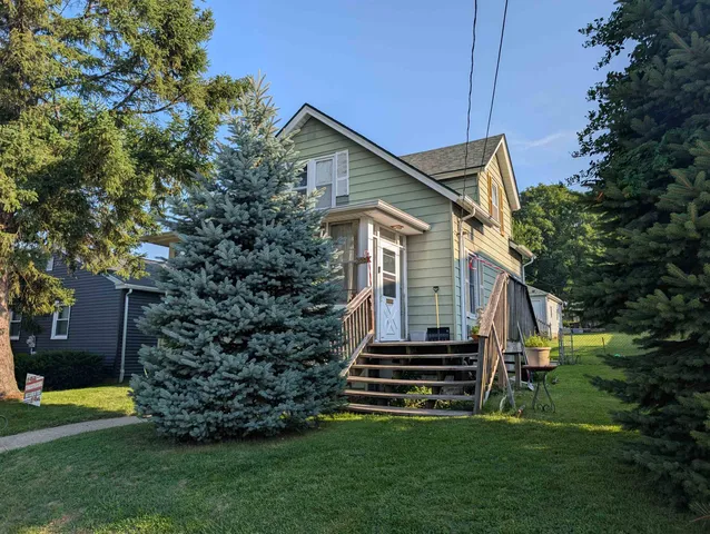 a house view with a garden space