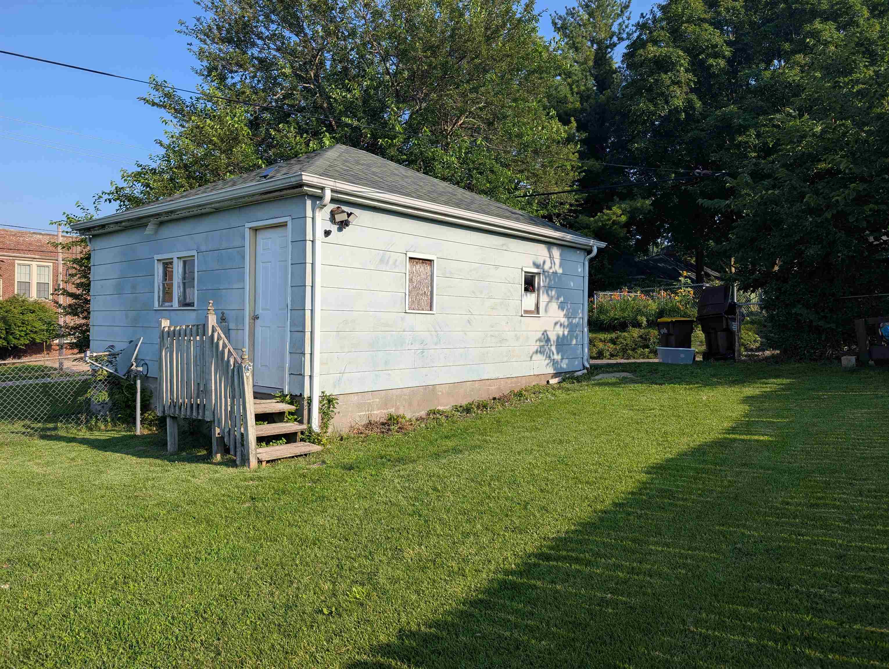 2208 13th Avenue Rockford, IL 61104 - Photo 5 of 5 a view of a backyard with a garden