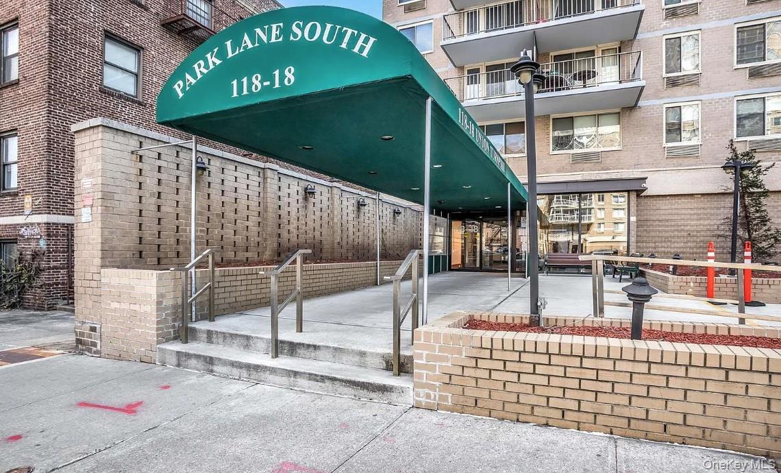 118-18 Union Turnpike, Unit 16A Queens, NY 11415 - Photo 2 of 13 a front view of a building