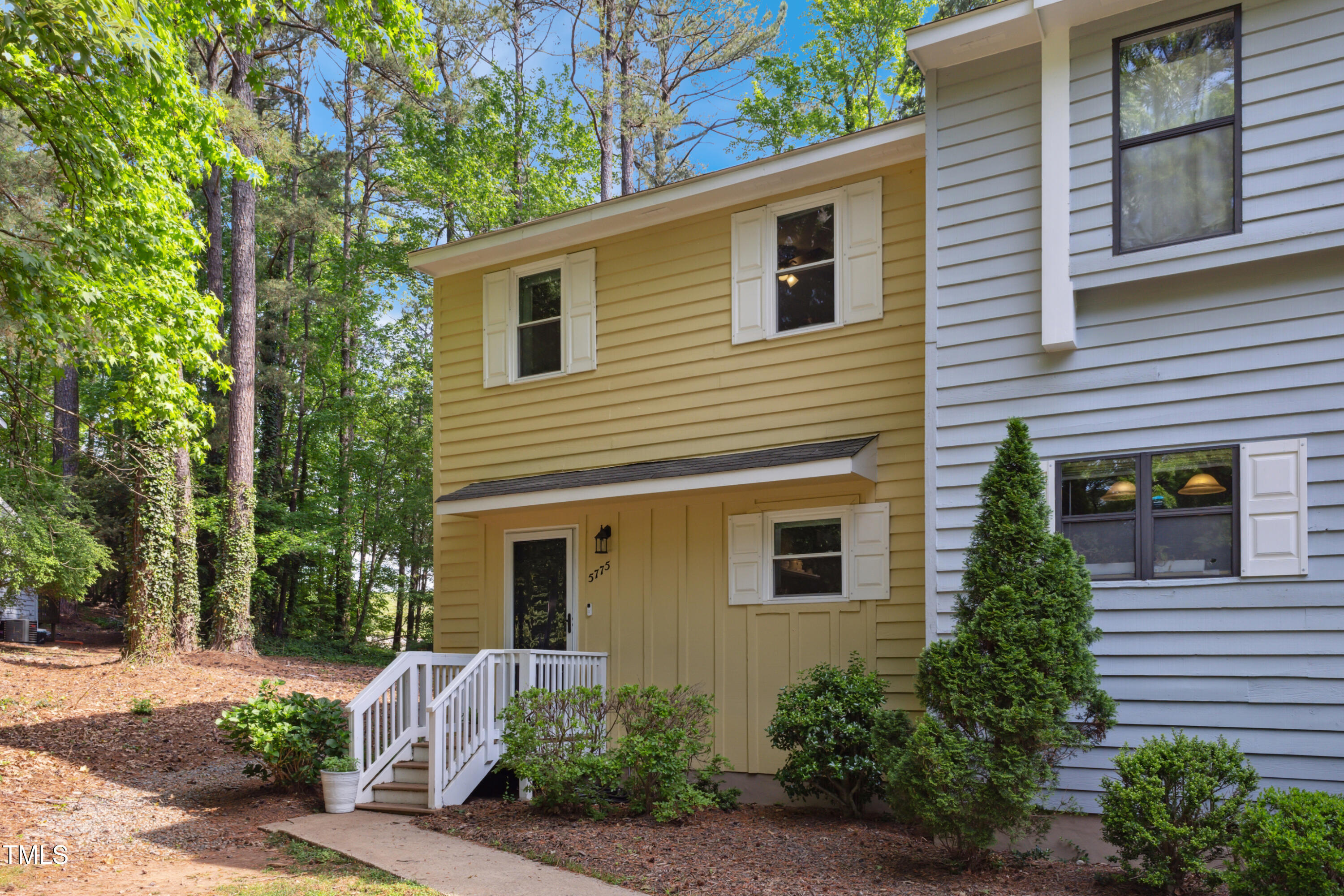 5775 Forest Lawn Court Raleigh, NC 27612 - Photo 2 of 45 a view of a house with a yard
