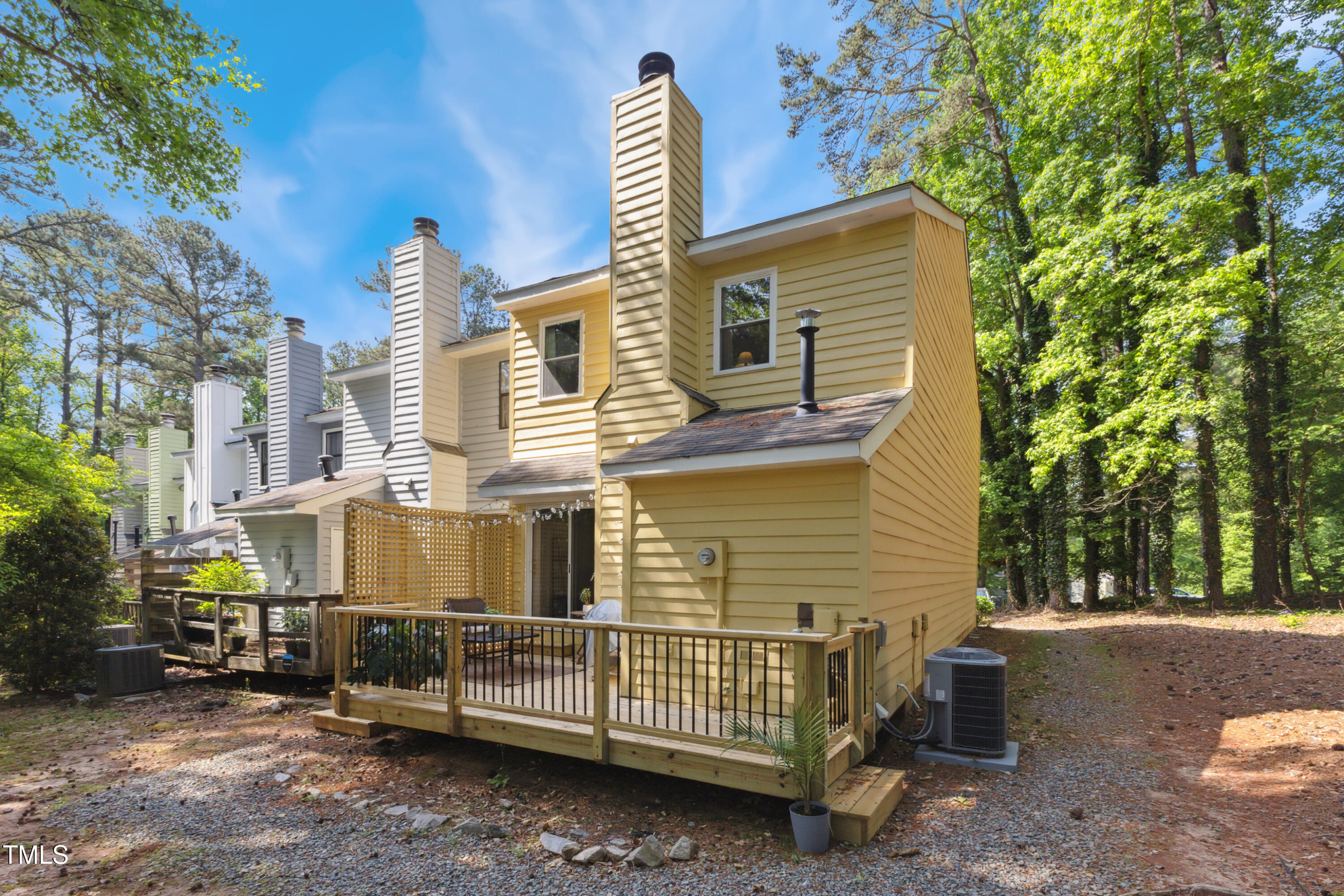 5775 Forest Lawn Court Raleigh, NC 27612 - Photo 35 of 45 a front view of a house with a yard