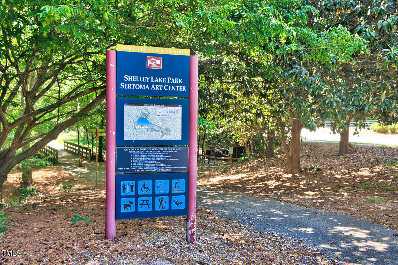 5775 Forest Lawn Court Raleigh, NC 27612 - Photo 43 of 45 a sign board with a small yard