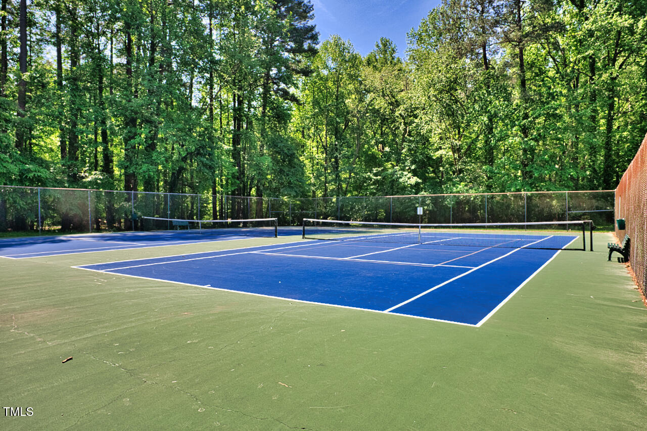 5775 Forest Lawn Court Raleigh, NC 27612 - Photo 44 of 45 a view of a tennis court