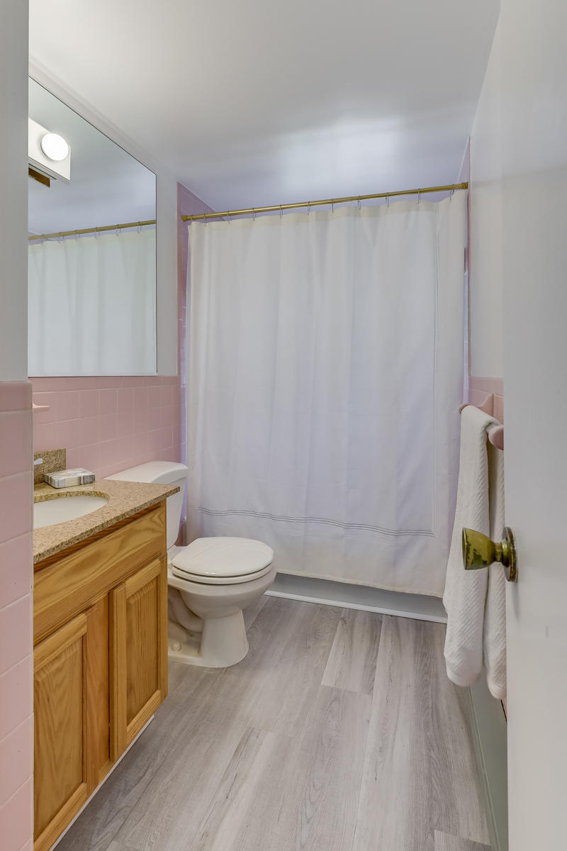 35 Higgins Hollow Road Truro, MA 02666 - Photo 15 of 20 a bathroom with a granite countertop sink a toilet and shower