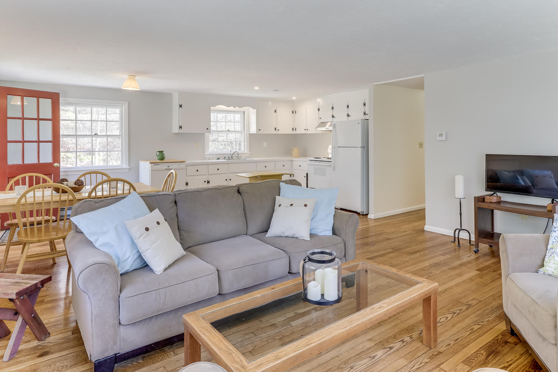 35 Higgins Hollow Road Truro, MA 02666 - Photo 16 of 20 a living room with furniture and a flat screen tv
