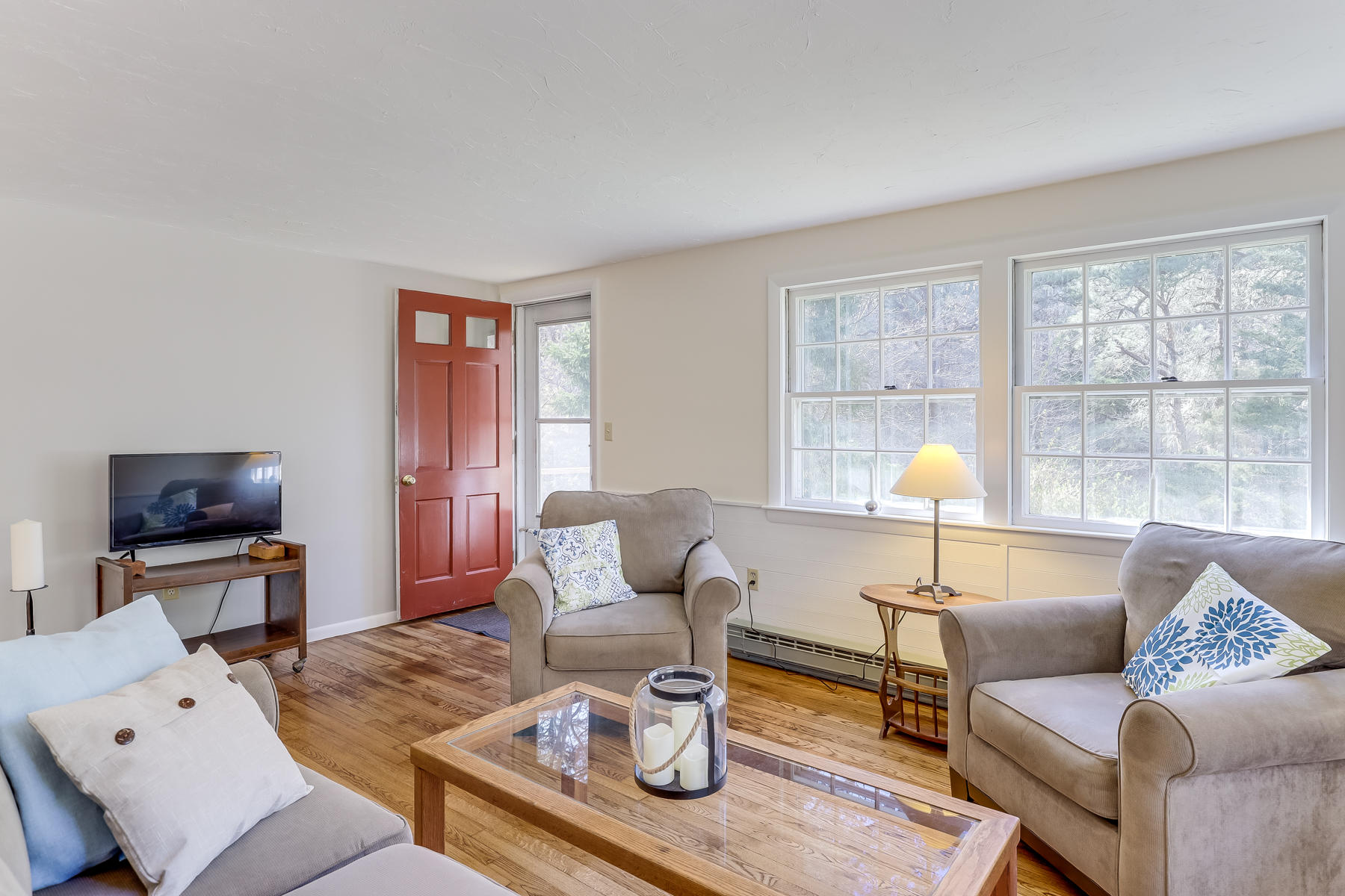 35 Higgins Hollow Road Truro, MA 02666 - Photo 3 of 20 a living room with furniture and a large window