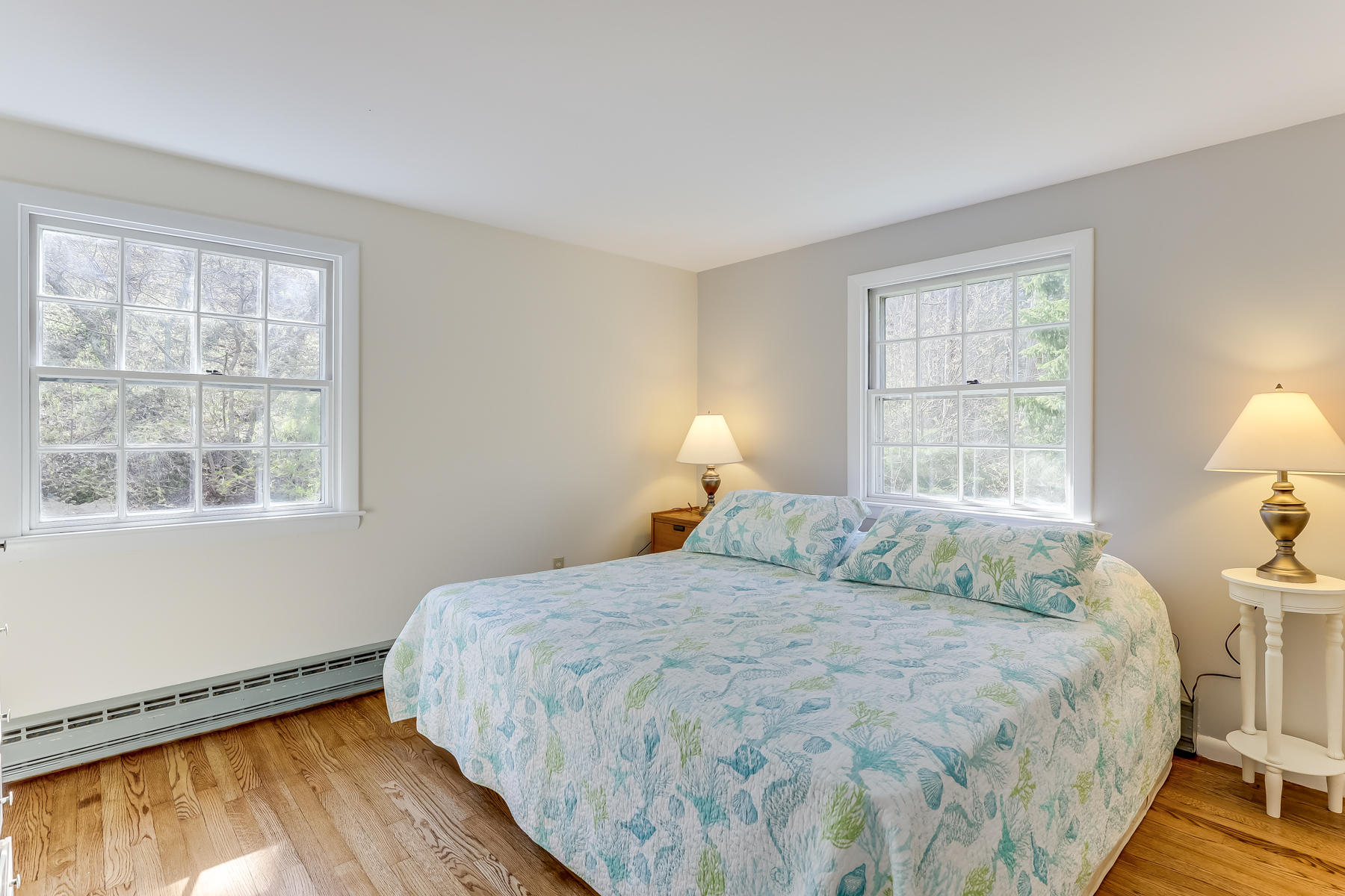 35 Higgins Hollow Road Truro, MA 02666 - Photo 8 of 20 a bedroom with a bed and a window