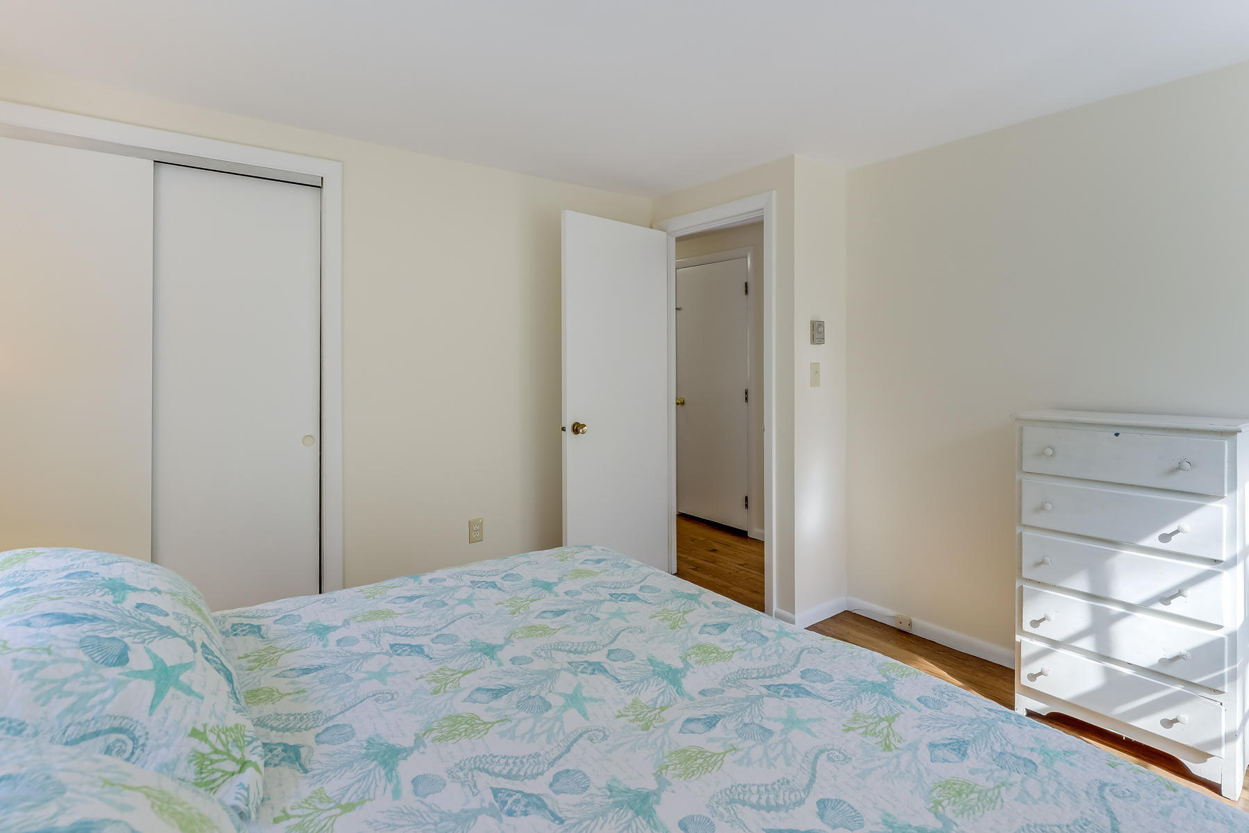 35 Higgins Hollow Road Truro, MA 02666 - Photo 9 of 20 a bedroom with a bed and a window