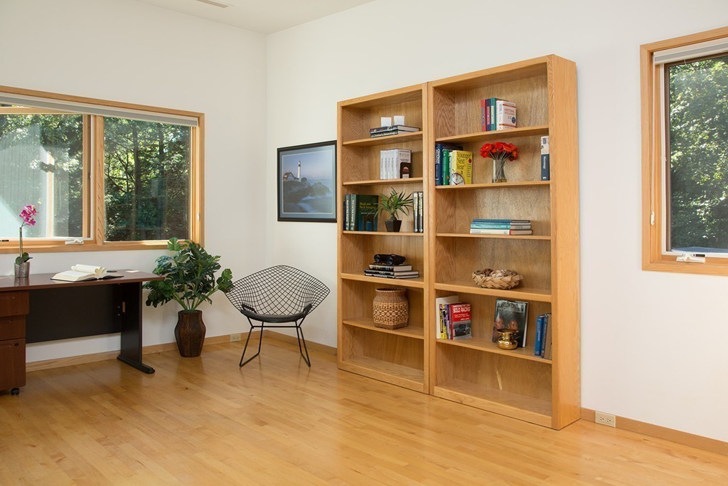 2 Barberry Road Lexington, MA 02421 - Photo 13 of 21 a living room with furniture cabinets and a floor to ceiling window