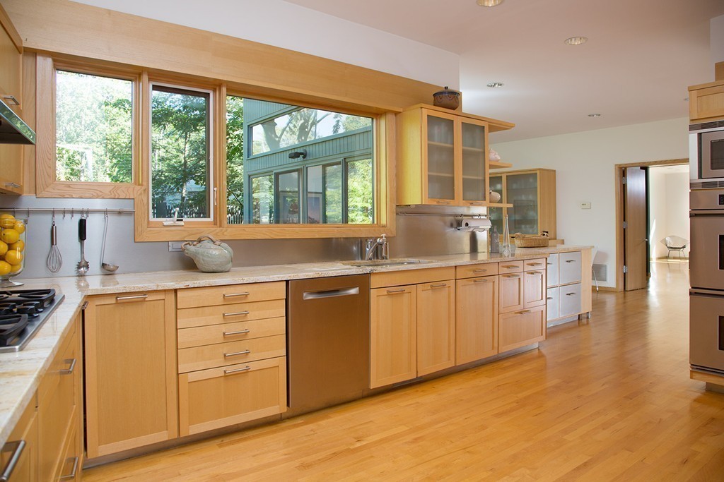 2 Barberry Road Lexington, MA 02421 - Photo 8 of 21 a kitchen with stainless steel appliances granite countertop a sink and cabinets