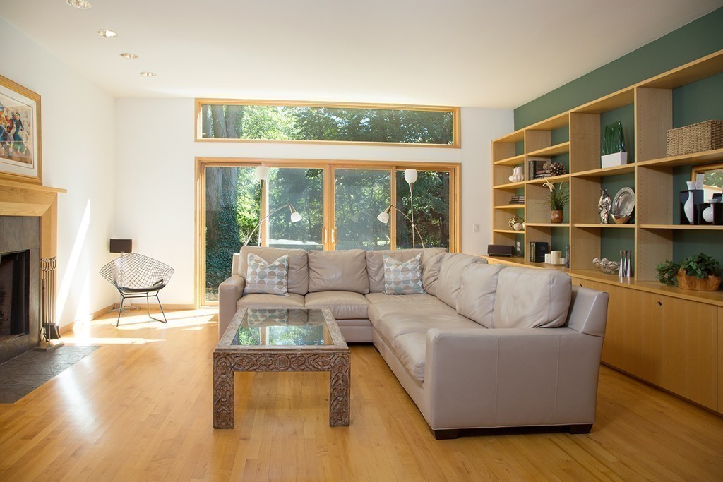 2 Barberry Road Lexington, MA 02421 - Photo 9 of 21 a living room with furniture and a floor to ceiling window