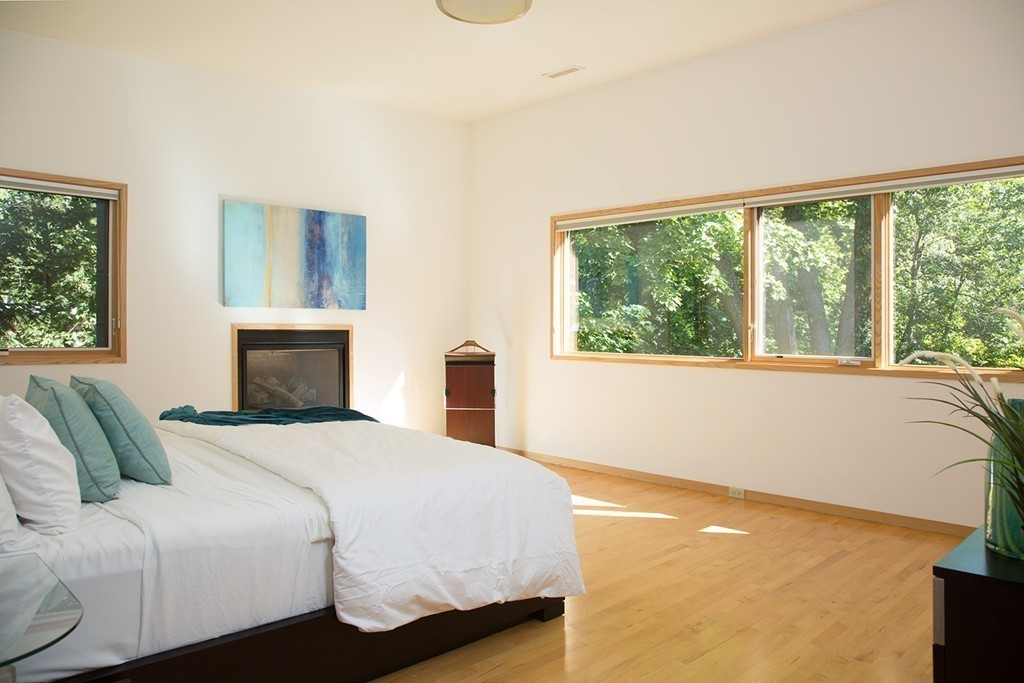 2 Barberry Road Lexington, MA 02421 - Photo 10 of 21 a bedroom with a bed and a large window