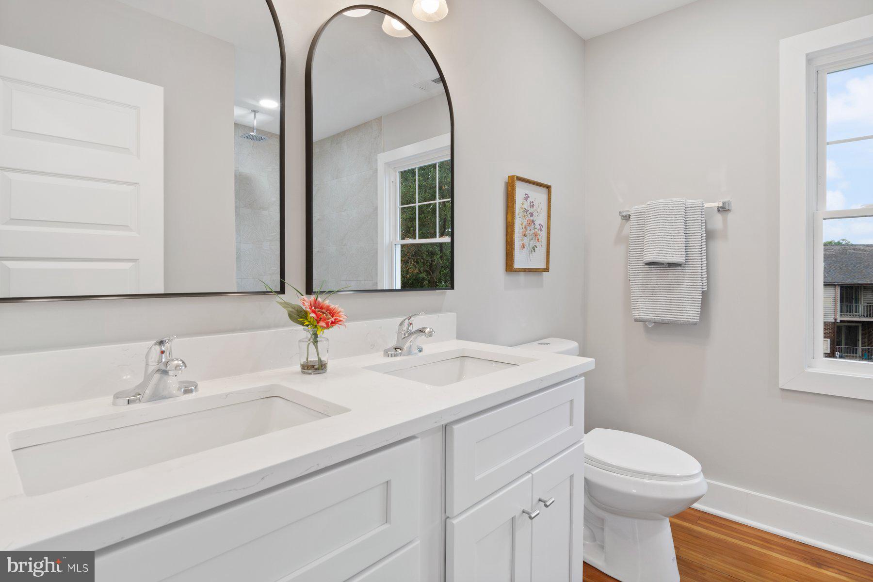 509 Valcour Road Catonsville, MD 21228 - Photo 18 of 40 a bathroom with a sink and a mirror