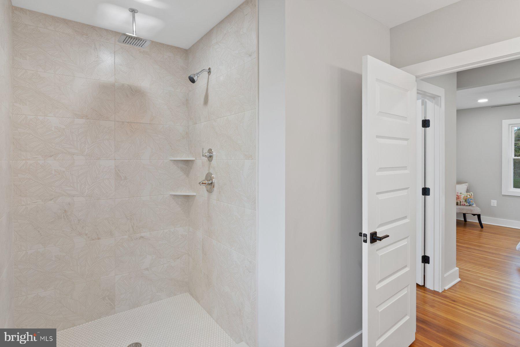 509 Valcour Road Catonsville, MD 21228 - Photo 19 of 40 a bathroom with a bathtub and a shower