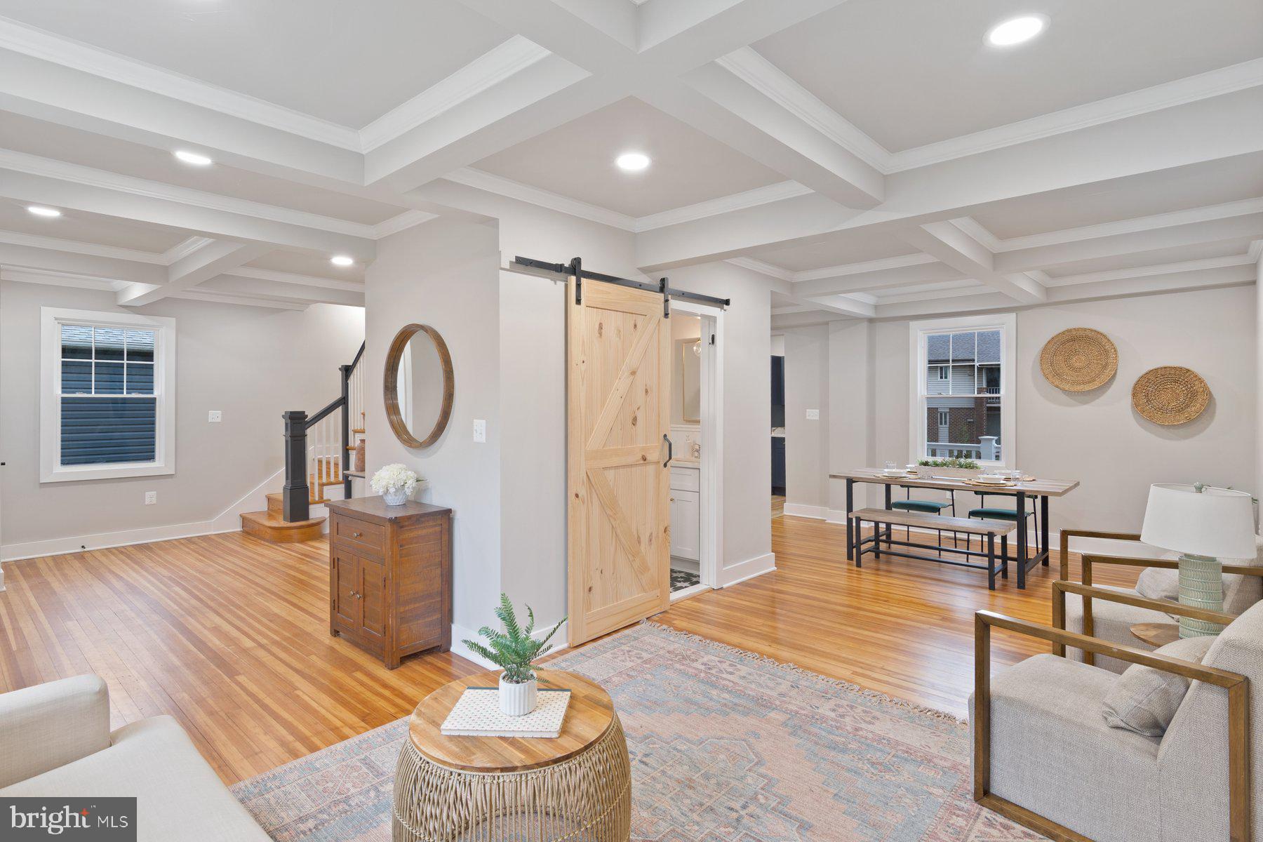 509 Valcour Road Catonsville, MD 21228 - Photo 2 of 40 a living room with furniture a dining table and a large window