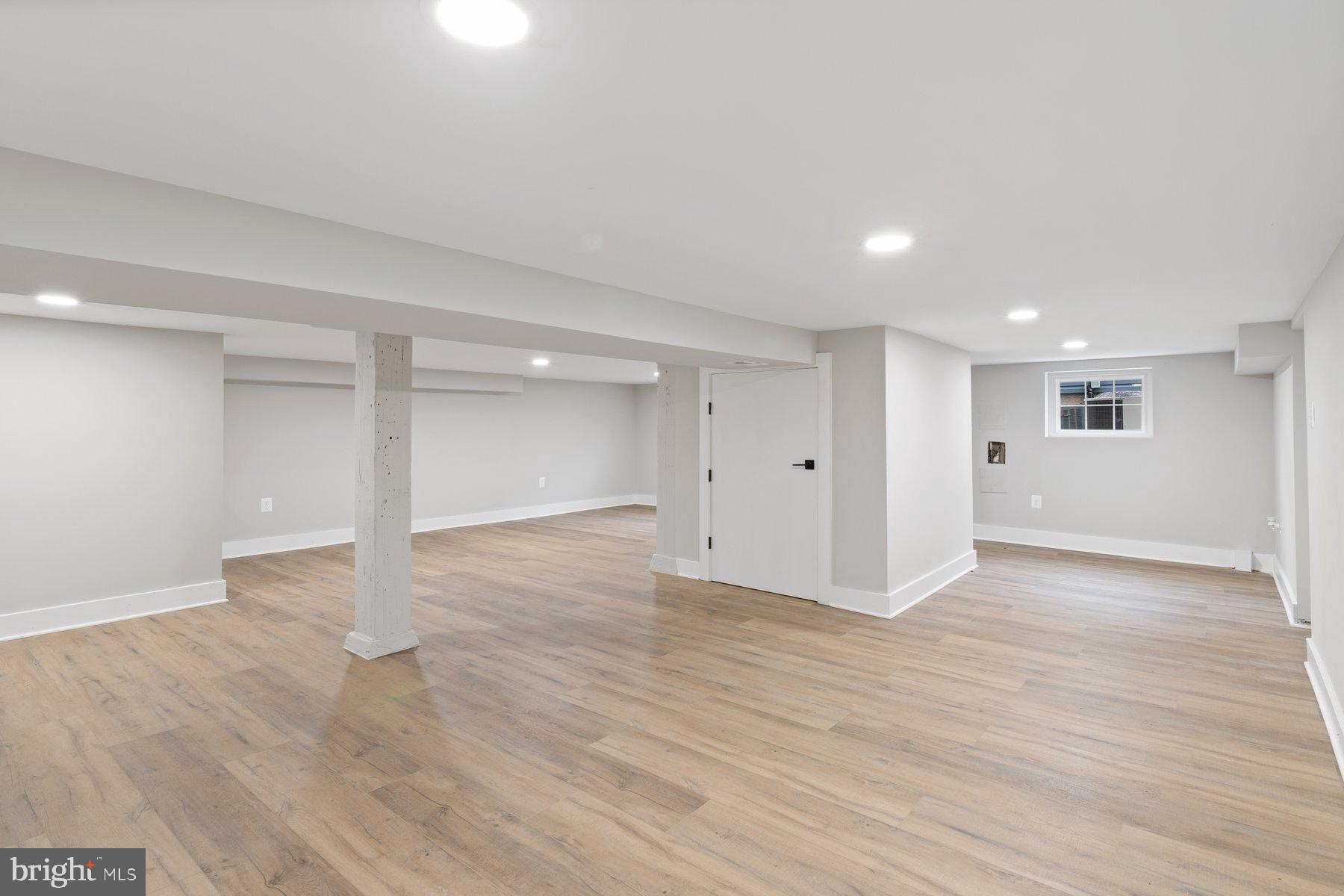 509 Valcour Road Catonsville, MD 21228 - Photo 28 of 40 a view of an empty room with wooden floor