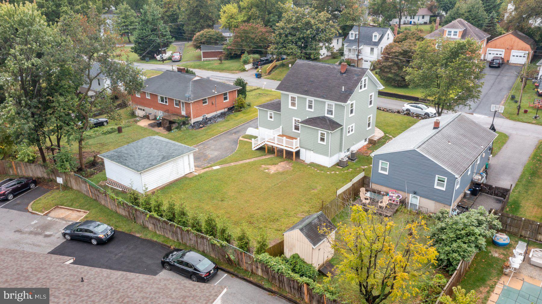 509 Valcour Road Catonsville, MD 21228 - Photo 32 of 40 an aerial view of residential house with outdoor space and parking