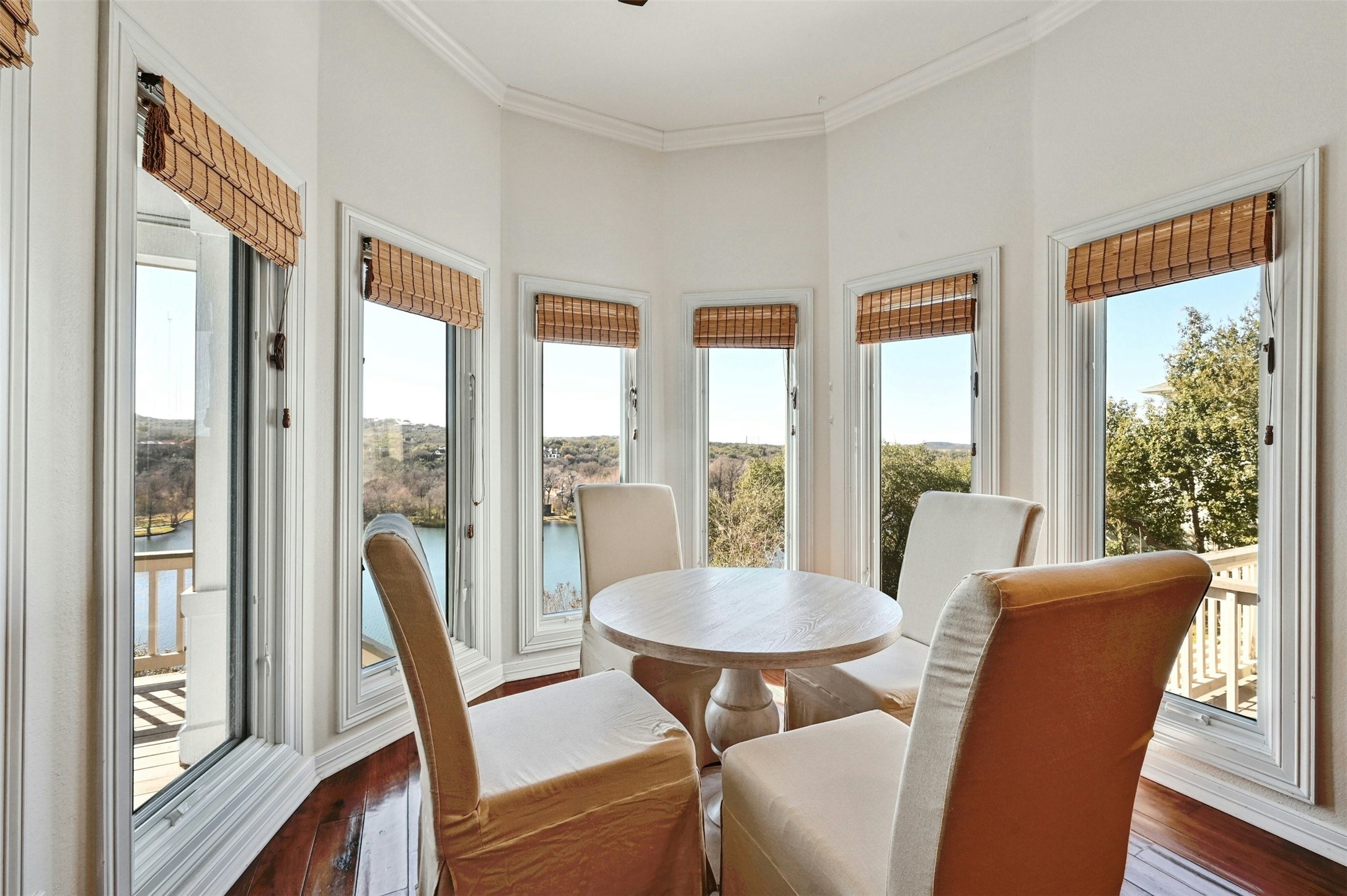 5606 Craggy Point Austin, TX 78731 - Photo 11 of 39 a view of a dining room with furniture window and wooden floor