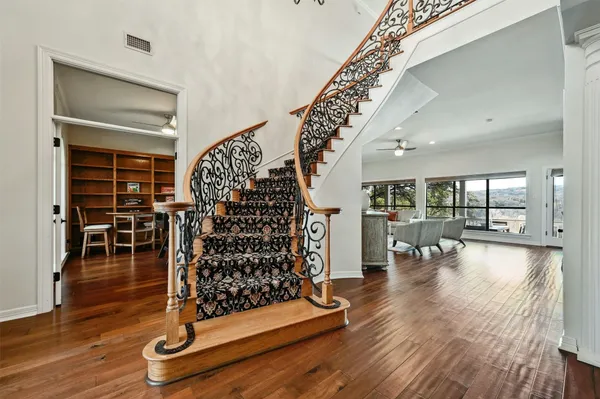 a view of entryway with wooden floor