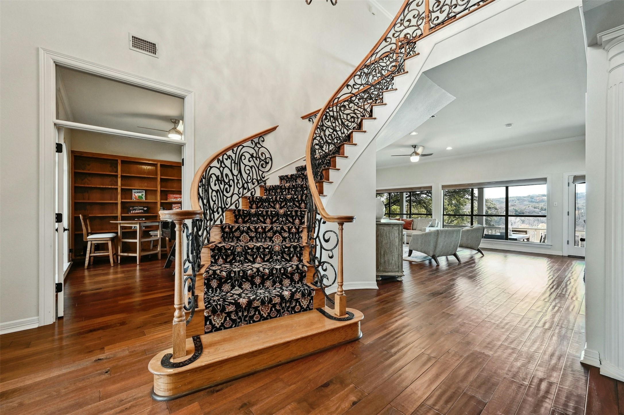 5606 Craggy Point Austin, TX 78731 - Photo 14 of 39 a view of entryway with wooden floor