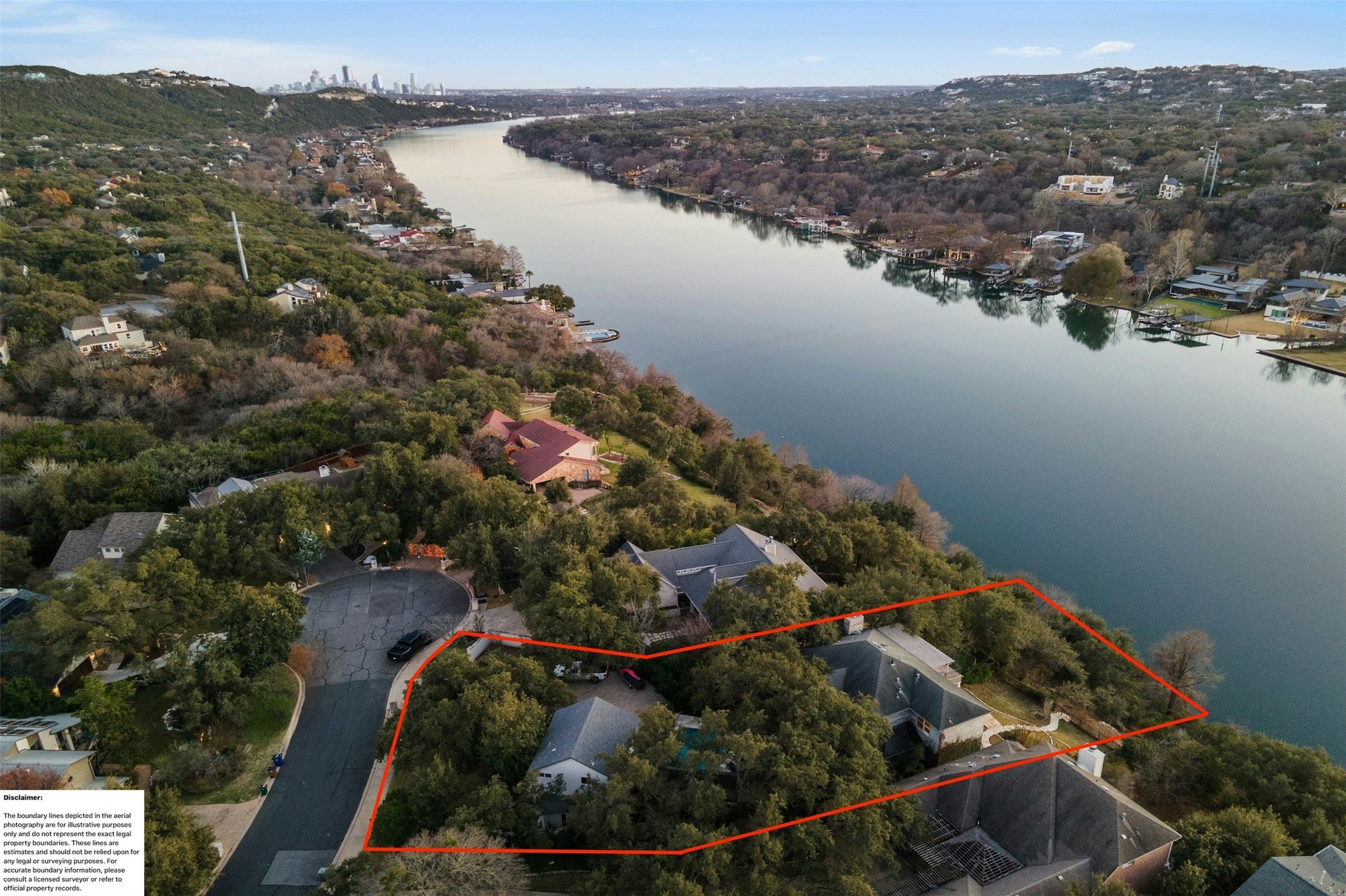 5606 Craggy Point Austin, TX 78731 - Photo 2 of 39 an aerial view of a house with a yard and lake view