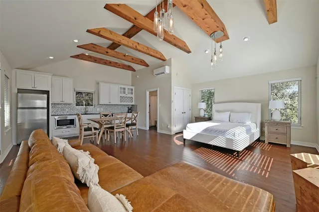 a living room with furniture and a table