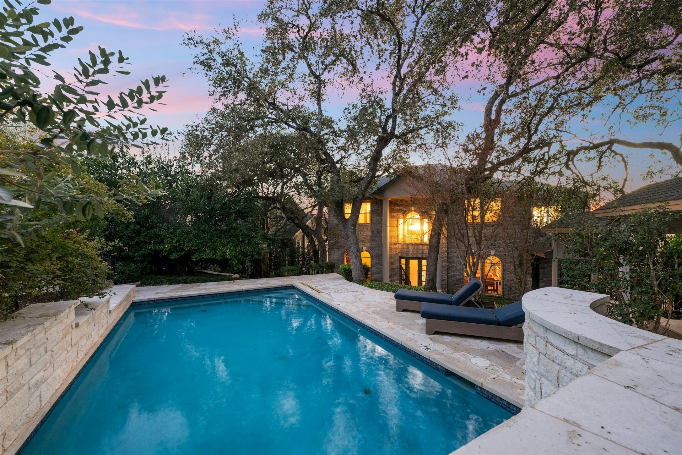 5606 Craggy Point Austin, TX 78731 - Photo 31 of 39 a view of a swimming pool with lounge chair