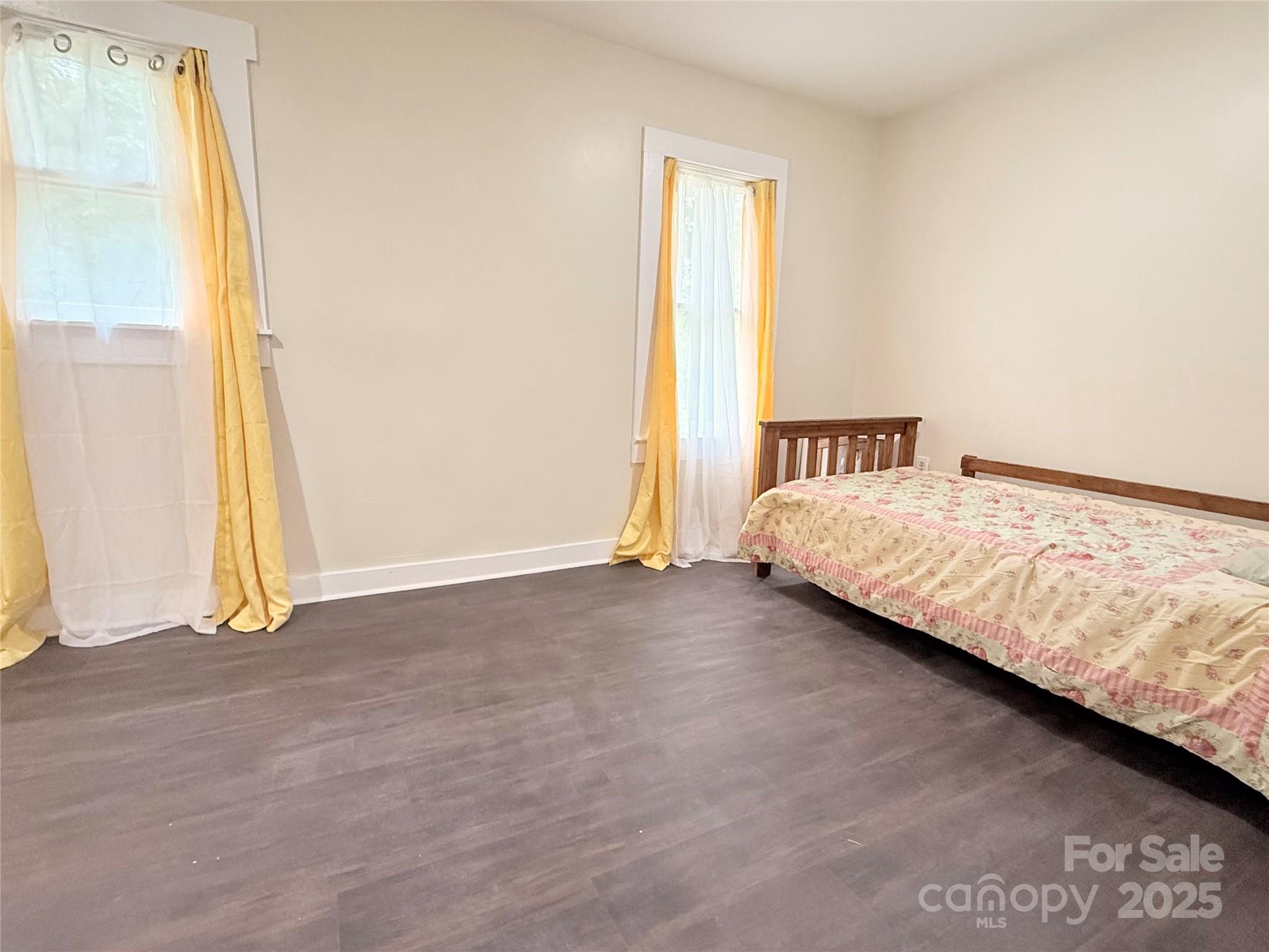 3465 Peniel Road Tryon, NC 28782 - Photo 11 of 21 a bedroom with a bed and a window