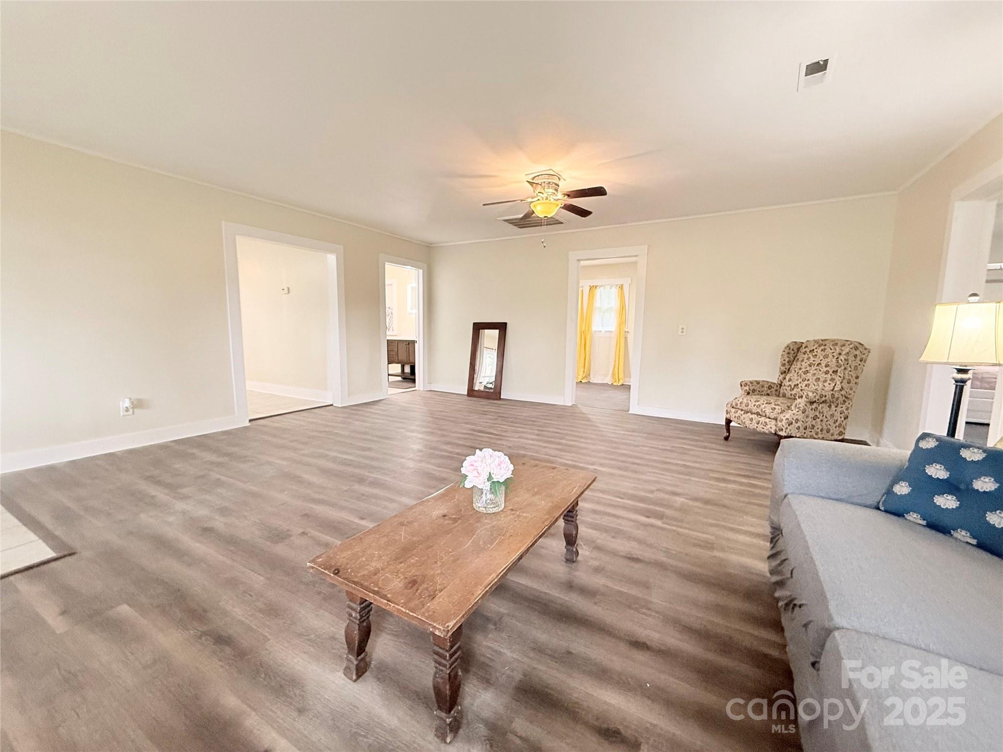 3465 Peniel Road Tryon, NC 28782 - Photo 5 of 21 a living room with furniture and wooden floor