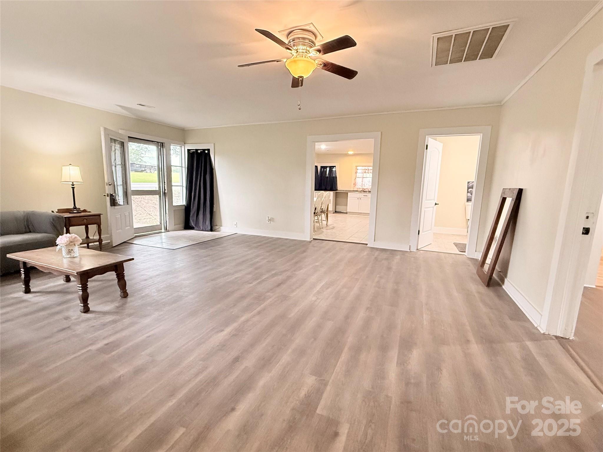 3465 Peniel Road Tryon, NC 28782 - Photo 6 of 21 a living room with furniture and a wooden floor