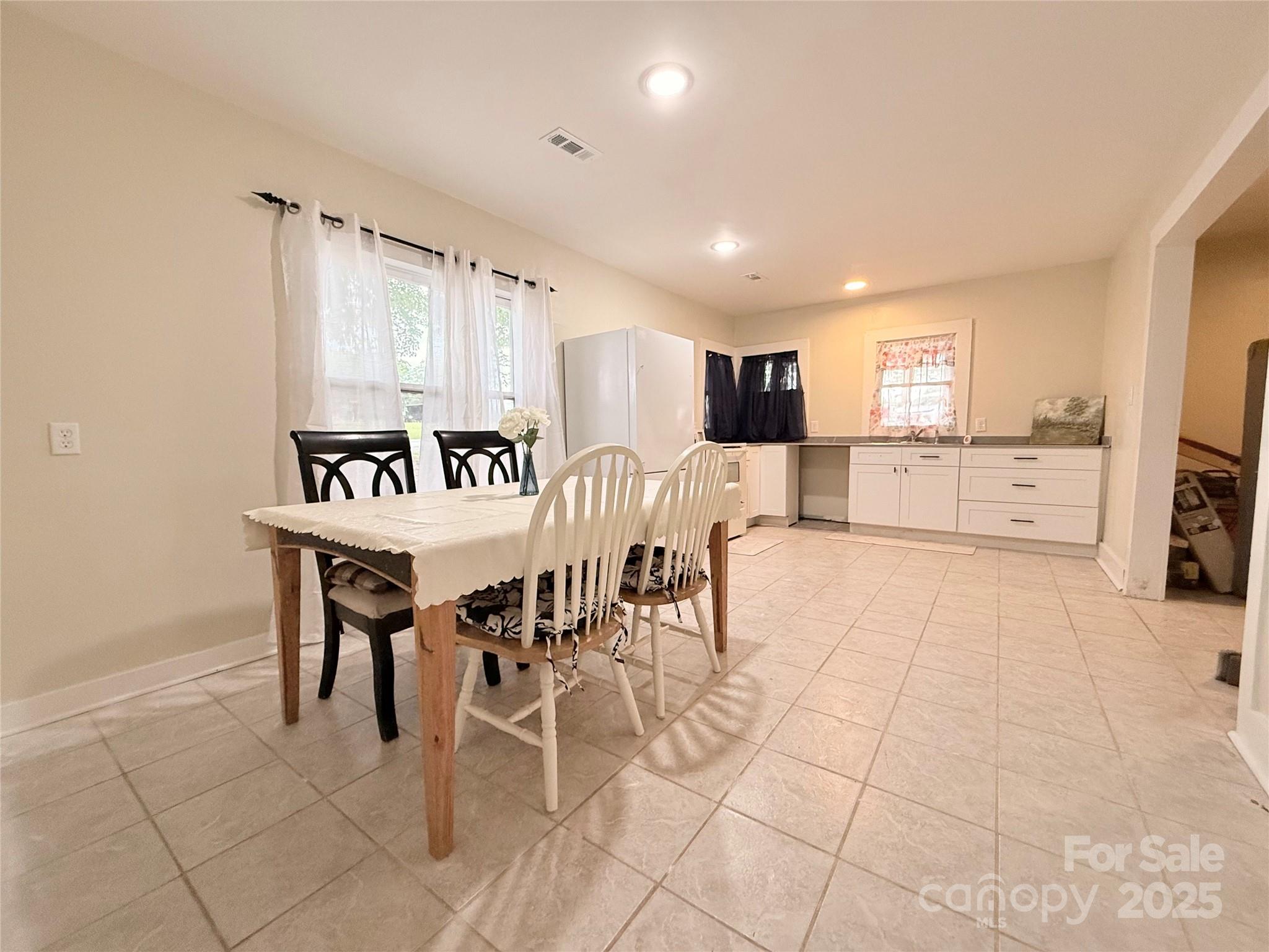3465 Peniel Road Tryon, NC 28782 - Photo 7 of 21 a view of a dining room with furniture