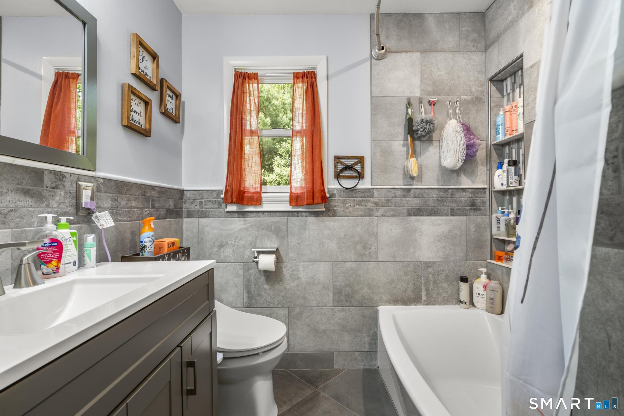 13 Christy Hill Road Ledyard, CT 06335 - Photo 15 of 38 a bathroom with a sink vanity mirror and toilet