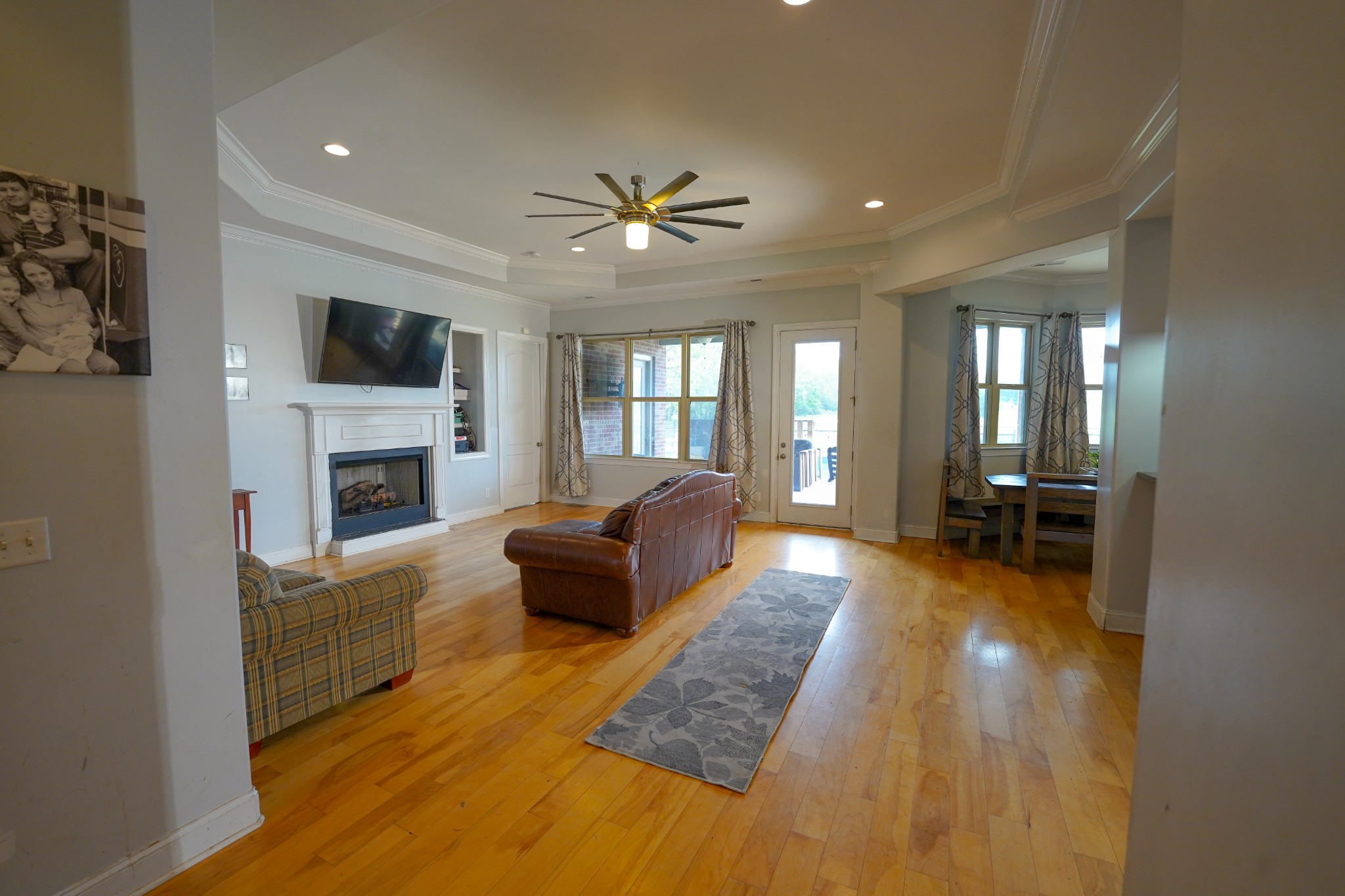 2172 Fellowship Road Mount Juliet, TN 37122 - Photo 18 of 53 a living room with fireplace furniture and a flat screen tv