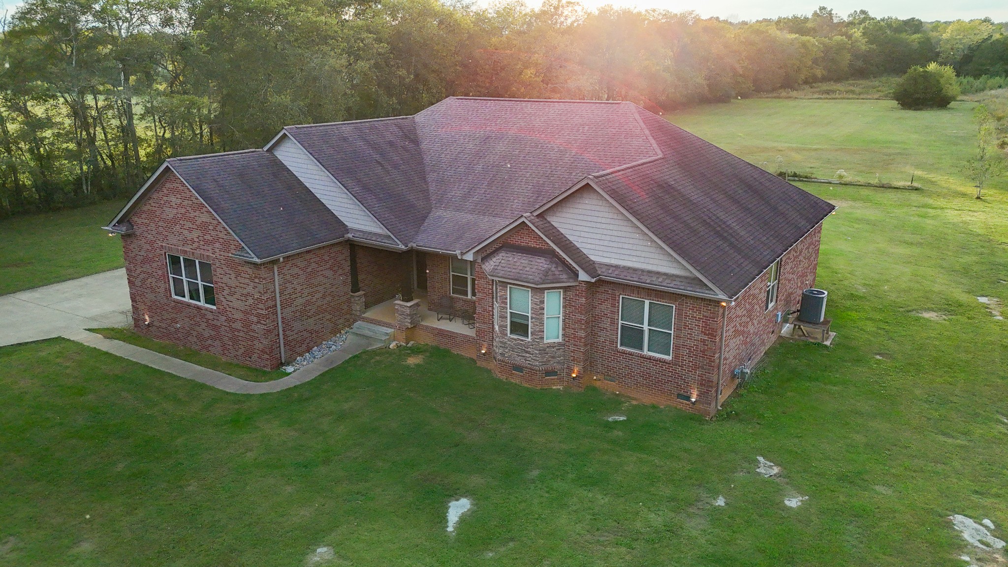 2172 Fellowship Road Mount Juliet, TN 37122 - Photo 2 of 53 a aerial view of a house with a yard and a garden
