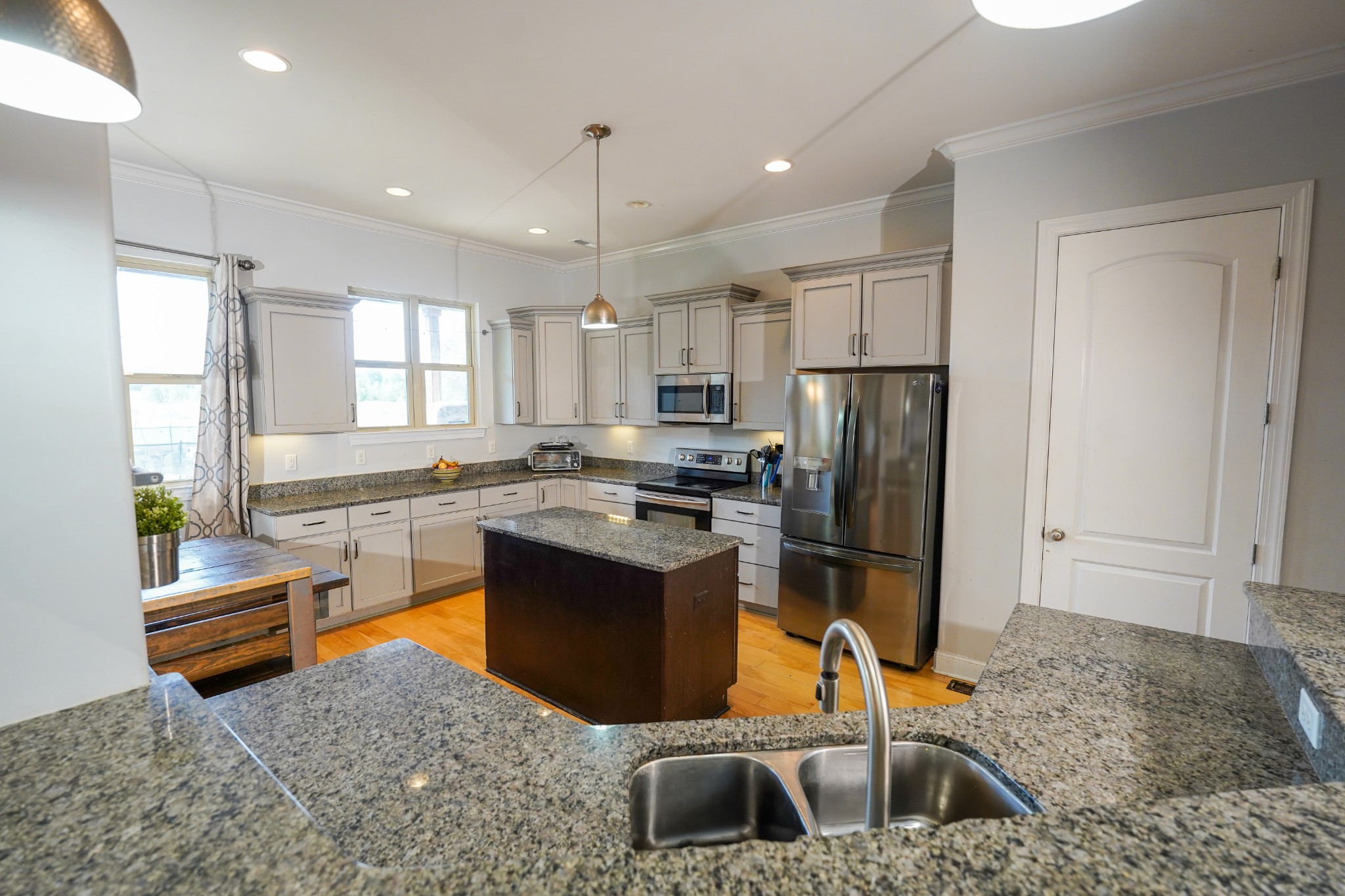 2172 Fellowship Road Mount Juliet, TN 37122 - Photo 21 of 53 a kitchen with stainless steel appliances granite countertop a refrigerator sink and stove