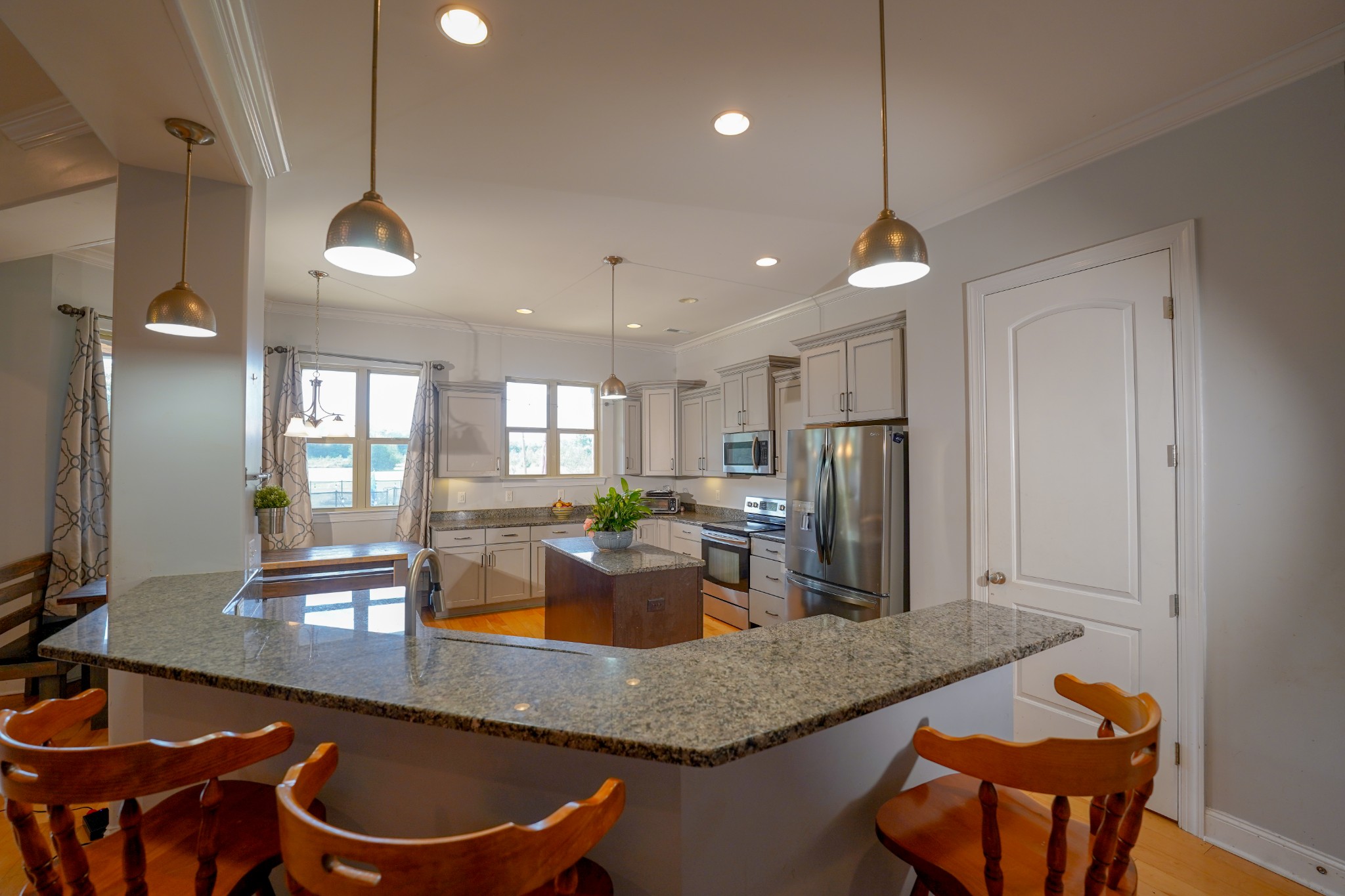 2172 Fellowship Road Mount Juliet, TN 37122 - Photo 22 of 53 a large kitchen with a table and chairs