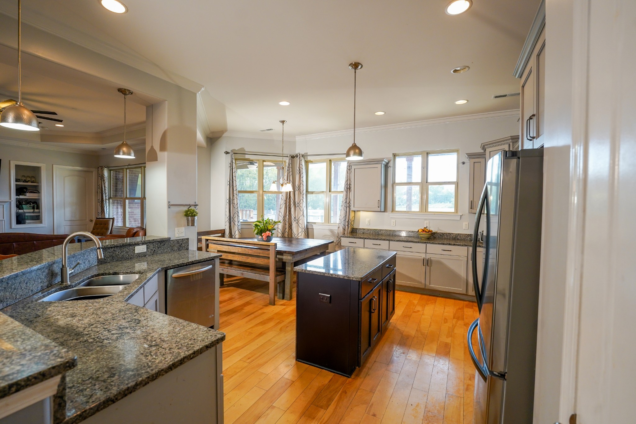 2172 Fellowship Road Mount Juliet, TN 37122 - Photo 23 of 53 a kitchen with stainless steel appliances granite countertop sink stove and refrigerator