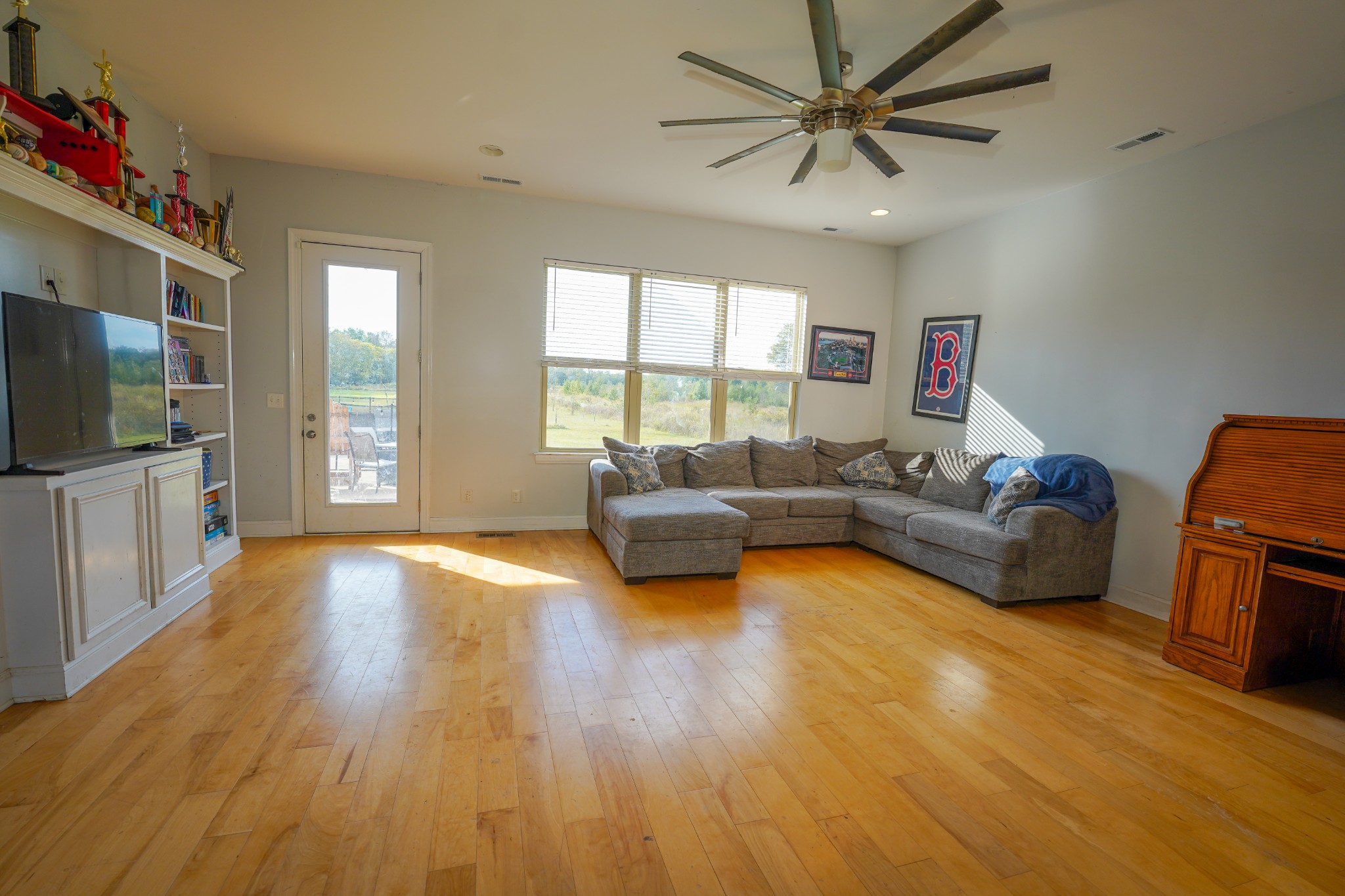 2172 Fellowship Road Mount Juliet, TN 37122 - Photo 28 of 53 a living room with furniture and a flat screen tv