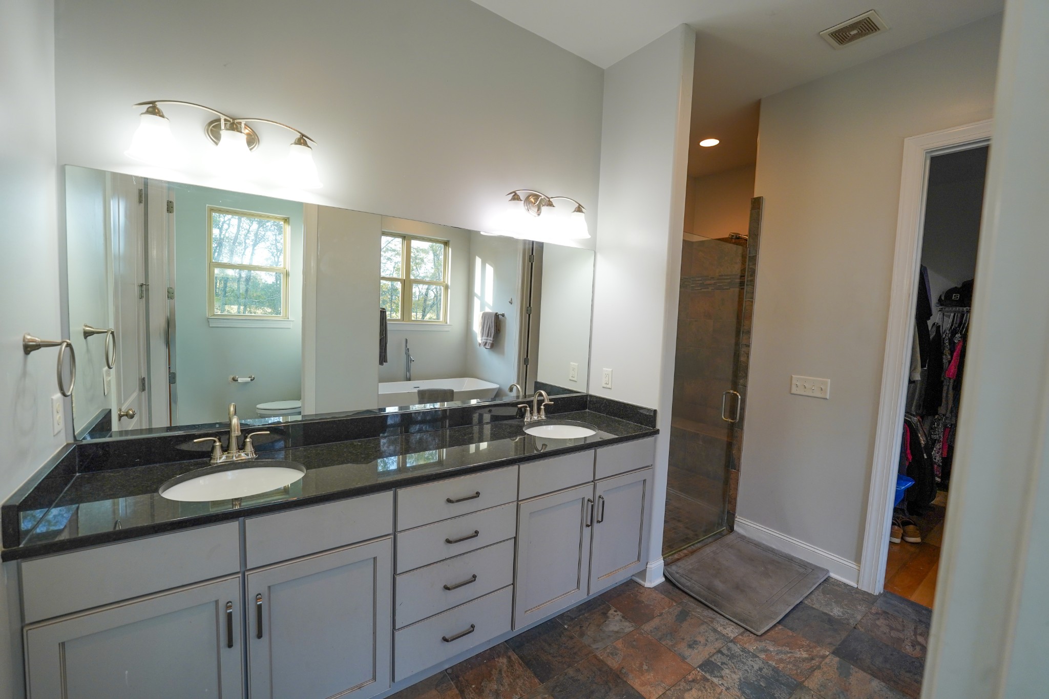 2172 Fellowship Road Mount Juliet, TN 37122 - Photo 34 of 53 a bathroom with double sink and a mirror